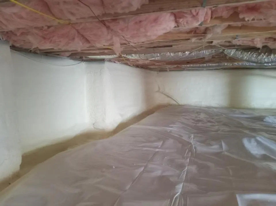 Crawl space encapsulation with closed-cell spray foam for Storm Damage Roof Repair in Erwin